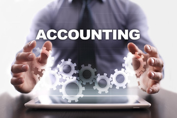 Businessman is using tablet pc and selecting accounting.