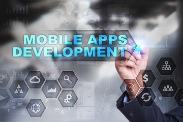 Businessman is drawing on virtual screen. mobile apps development concept.