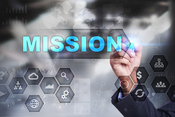 Businessman is drawing on virtual screen. mission concept.