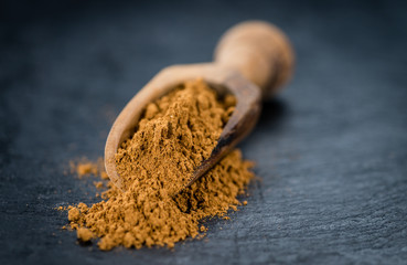 Some Cinnamon (ground) on a dark slate slab
