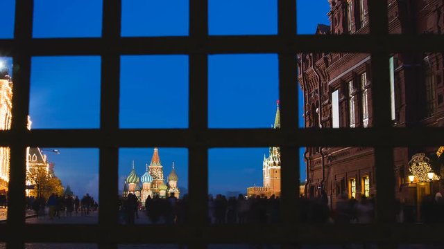 St. Basils cathedral and Kremlin tower at night from Red Square hyperlapse in Moscow, Russia