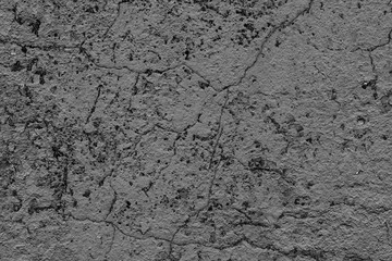 Wall fragment with scratches and cracks