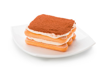 Tiramisu on white plate isolated. Clipping path.