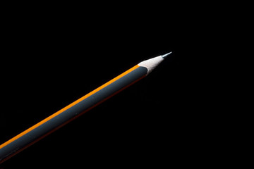 black pencil on black background