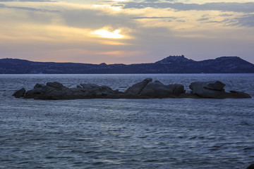 Naklejka na ściany i meble In Sardegna mare e cielo, acqua e rocce, tramonti e alba, un isola in Italia