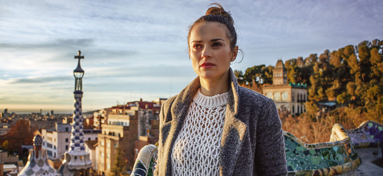 traveller woman at Guell Park in Barcelona looking into distance