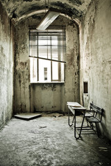 Ruined room in abandoned psychiatric hospital. Limbiate, Milan (Italy)
