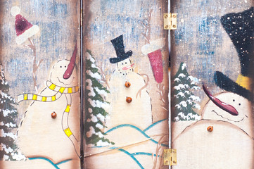 Christmas decorations in the form of screens with snowmen