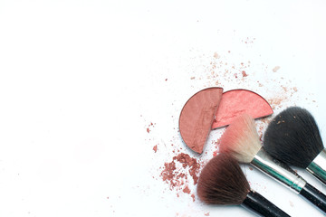 Brush and cosmetic isolated on a white background