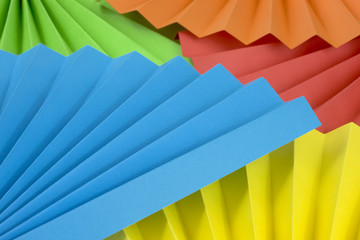 Multi colored paper fans. Picture taken in studio with soft-box.