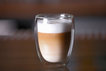 Cup of hot coffee in cafe
