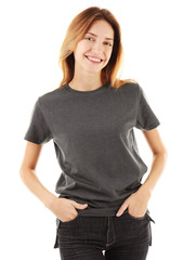 Obraz premium Young woman in blank grey t-shirt on white background