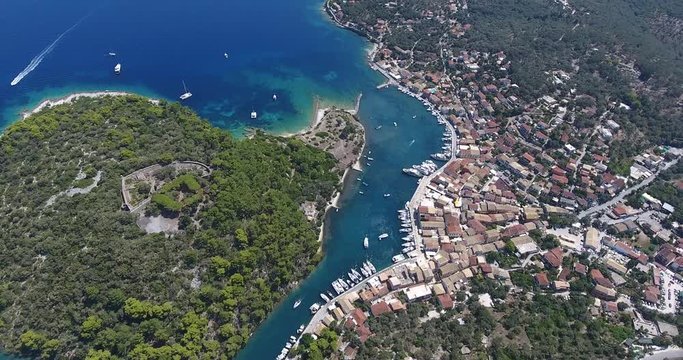 Paxos island capital bay city Gaios near Corfu Island, Kerkyra, Greece. Aerial video from a drone