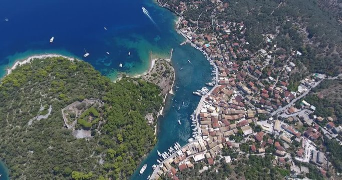 Paxos island capital bay city Gaios near Corfu Island, Kerkyra, Greece. Aerial video from a drone
