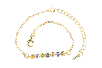 Gold bracelet with three diamonds, isolated on white background, clipping path included