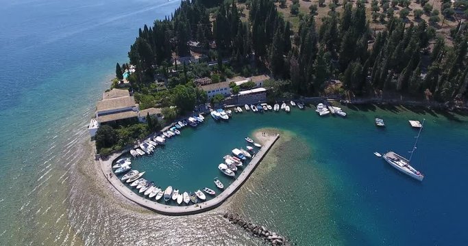 Corfu Kouloura bay aerial view from a drone. Old fisherman village in Kerkyra Island, Greece