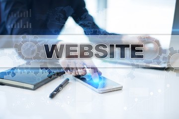 Businessman working in office, pressing button on virtual screen and selecting website.