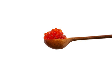 Red caviar in the wooden spoon isolated on white background.