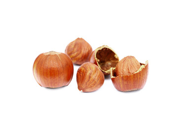 Group fresh hazelnuts isolated on white background