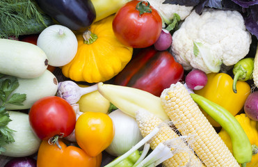Background of fresh vegetables and greens closeup