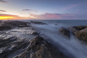 The beautiful scenery of the dusk in Kudat Sabah Borneo. Long exposure photograph with grain. Image contain certain grain or noise and soft focus.