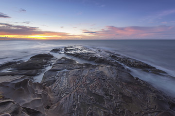The beautiful scenery of the dusk in Kudat Sabah Borneo. Long exposure photograph with grain. Image...