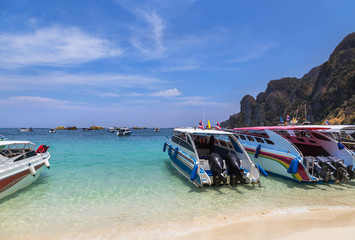 speedboats moored in andaman sea at Phi Phi Don island , Thailand