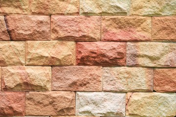 Sandstone brick wall texture background 