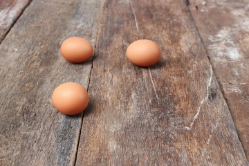  egg select focus with shallow depth of field on wood background