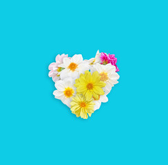 Heart of flowers (Dahlia). Postcard for Valentine's day. Flat lay. Flowers on turquoise background