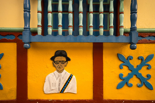 closeup details of house faced painting called zocalos in Guatape Colombia