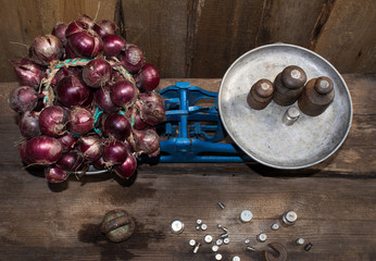 Bow to weigh on the old scale, spices, food for sale, small business, agriculture,