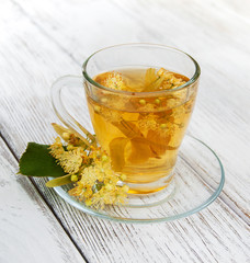 cup of herbal tea with linden flowers