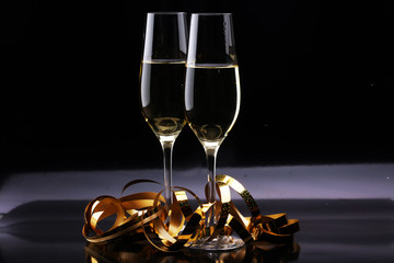 Conceptual Golden Brown Wine on Elegant Glass with Spiral Thin Wrapping Foils or Laces Decoration, on Abstract Brown Background