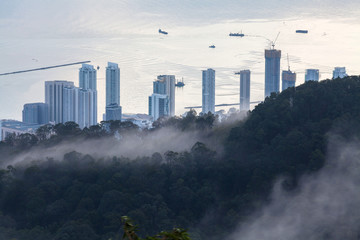 Fototapeta na wymiar Cityscape, mountain and fog sea view for background