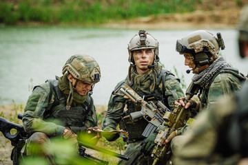 Fototapeta premium rangers on the Outdoor of looking at the map