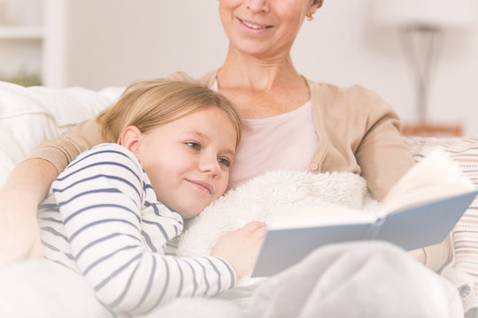 Cancer woman reading to child
