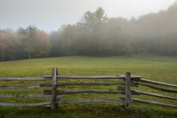 Split Rail Fence On Edge of Foggy Field