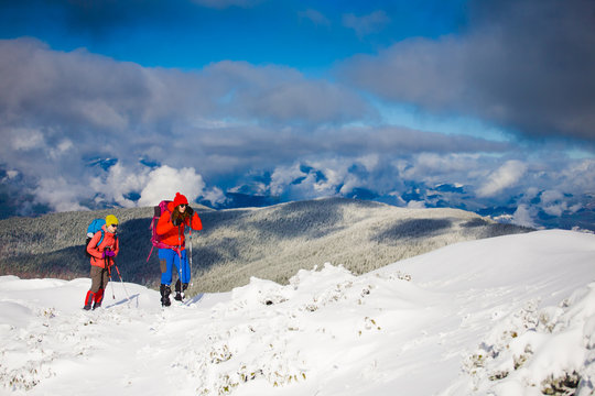 Climbers are on snow.