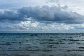 Stormy clouds over dark ocean in Thailand