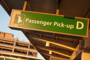 Passengers pick-up area in terminal D of JFK International airport, NYC