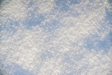 background of the sparkling fresh white snow