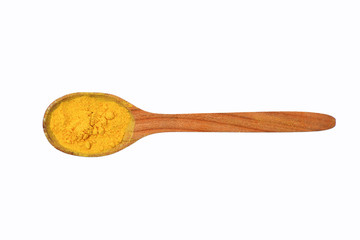 colorful turmeric in wooden spoon