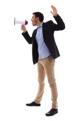 Fototapeta premium young man shouting with the megaphone in hand
