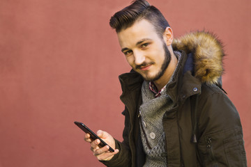 young chatting with the cellphone sitting man © tetxu