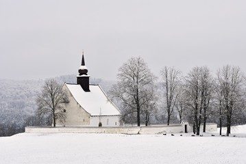 Winter landscape with a beautiful chapel near castle Veveri. Czech Republic city of Brno. The Chapel of the Mother of God.