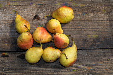 Yellow pears on old table, ripe pears, food for sale, small business, agriculture,