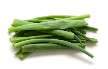 Sliced, chopped spring onions, salad onions, green onions or scallions on the white background