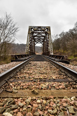 Looking down the tracks at railroad bridge