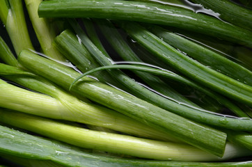 Closeup of Onions - Washing onions with water before cutting